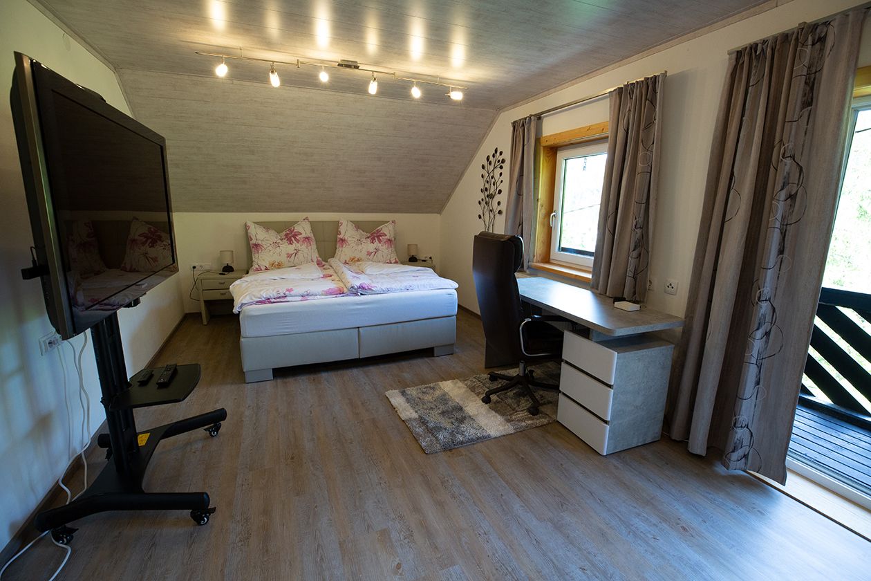 Schlafzimmer mit Balkon